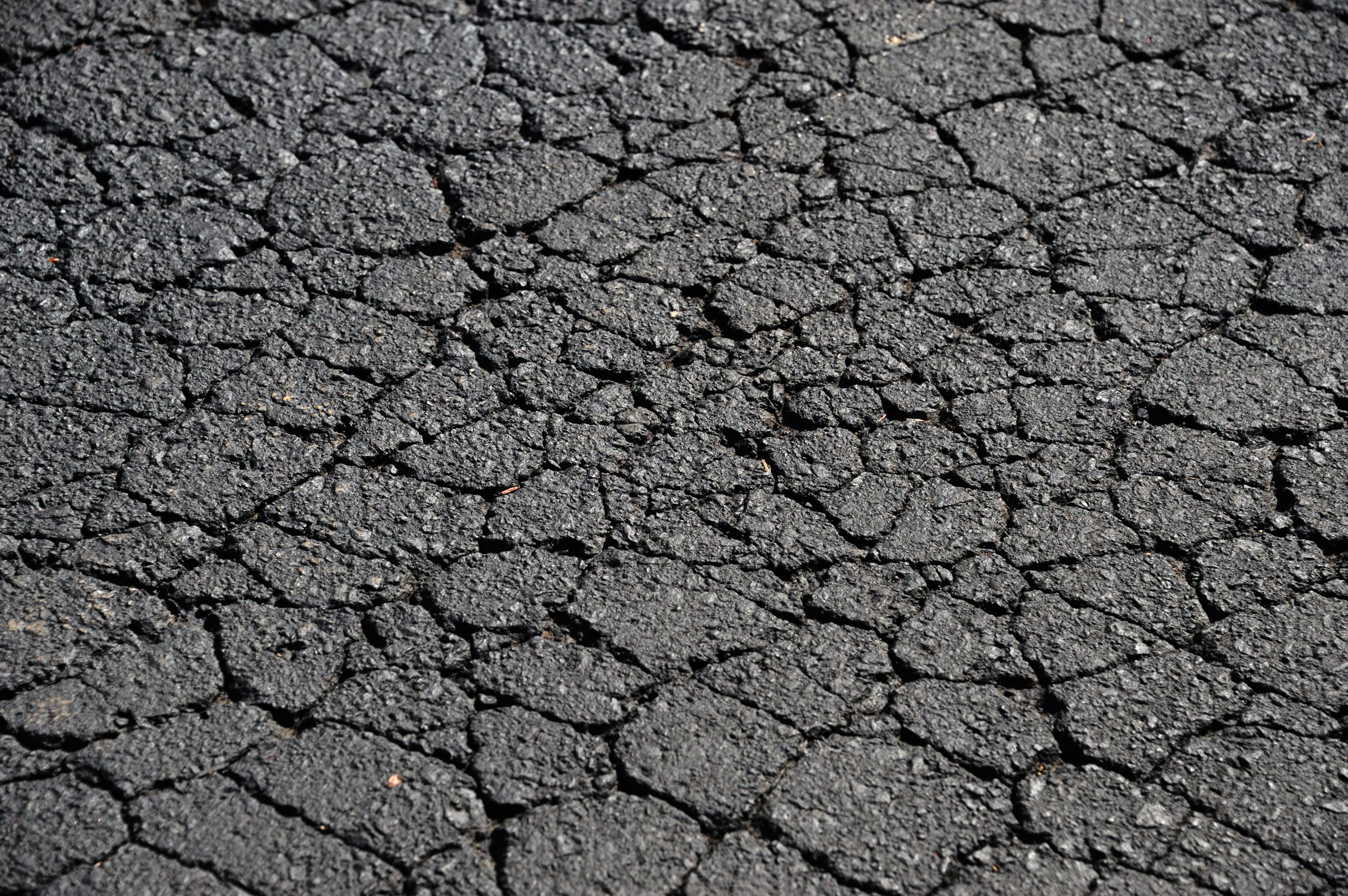 cracked asphalt road surface background